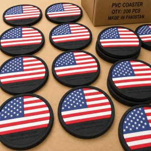 Custom USA flag PVC coasters with debossed Reedot Sports branding in bulk production.